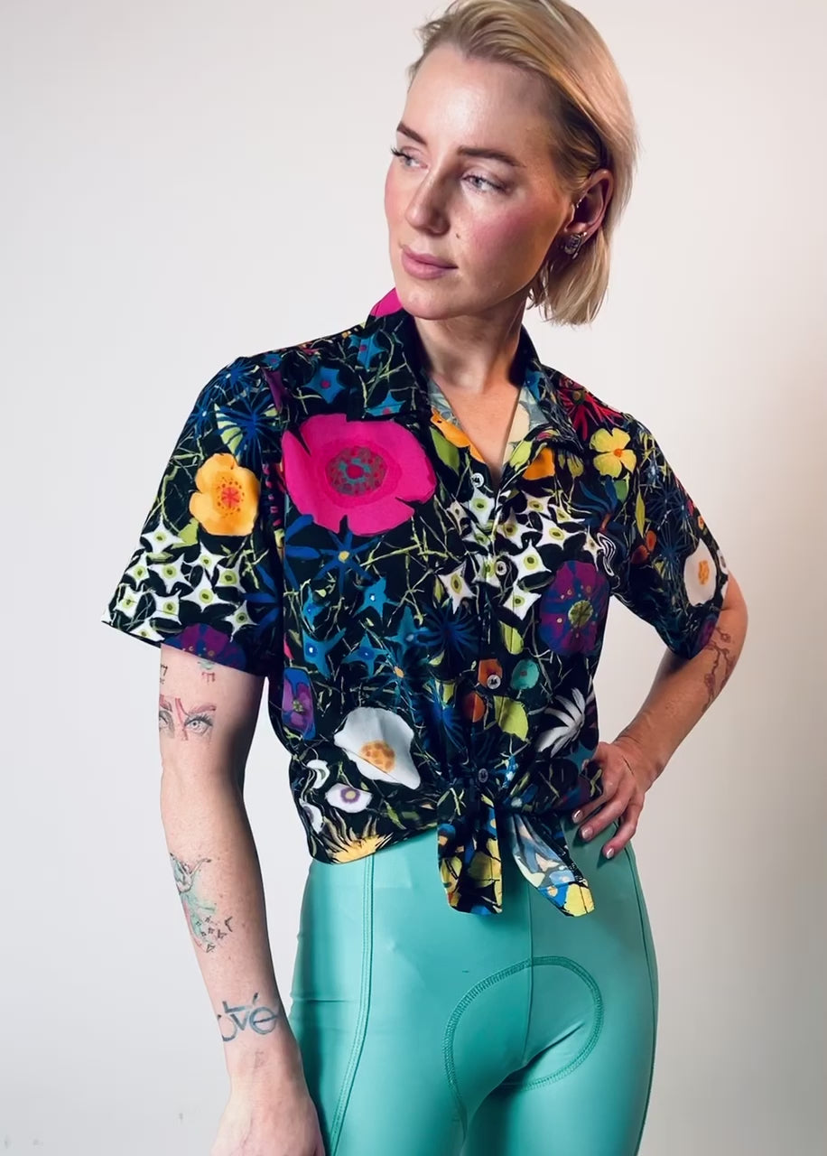Women Spinning in Studio showing Fioiri Notturni Resort Shirts